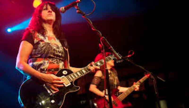 Kim McAuliffe (Girlschool) Biography